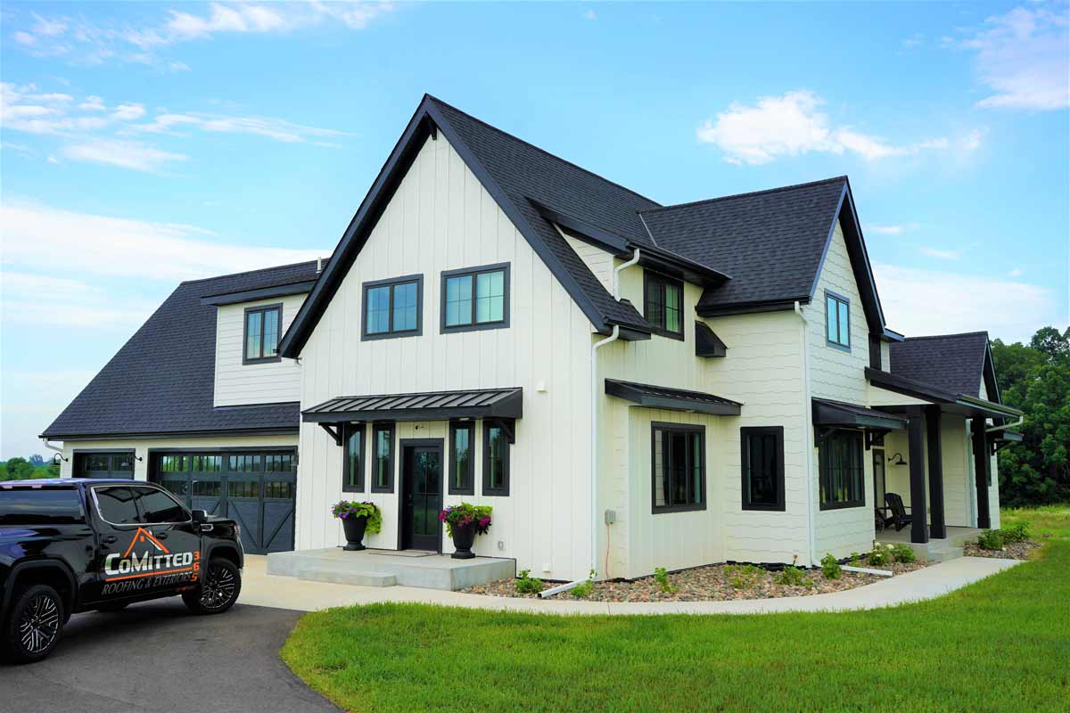 Modern Asphalt Shingles Installed On A Stylish Residential Roof In St. Cloud