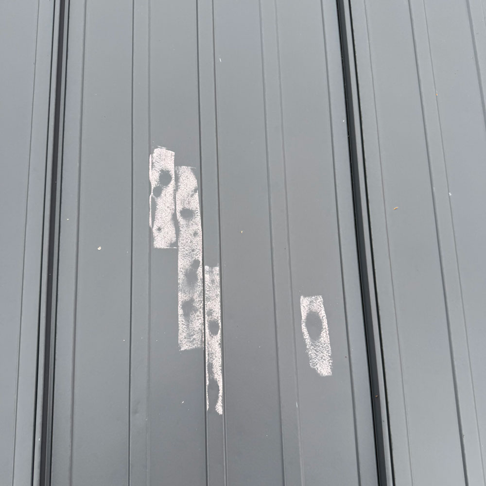 hail damage on metal roof